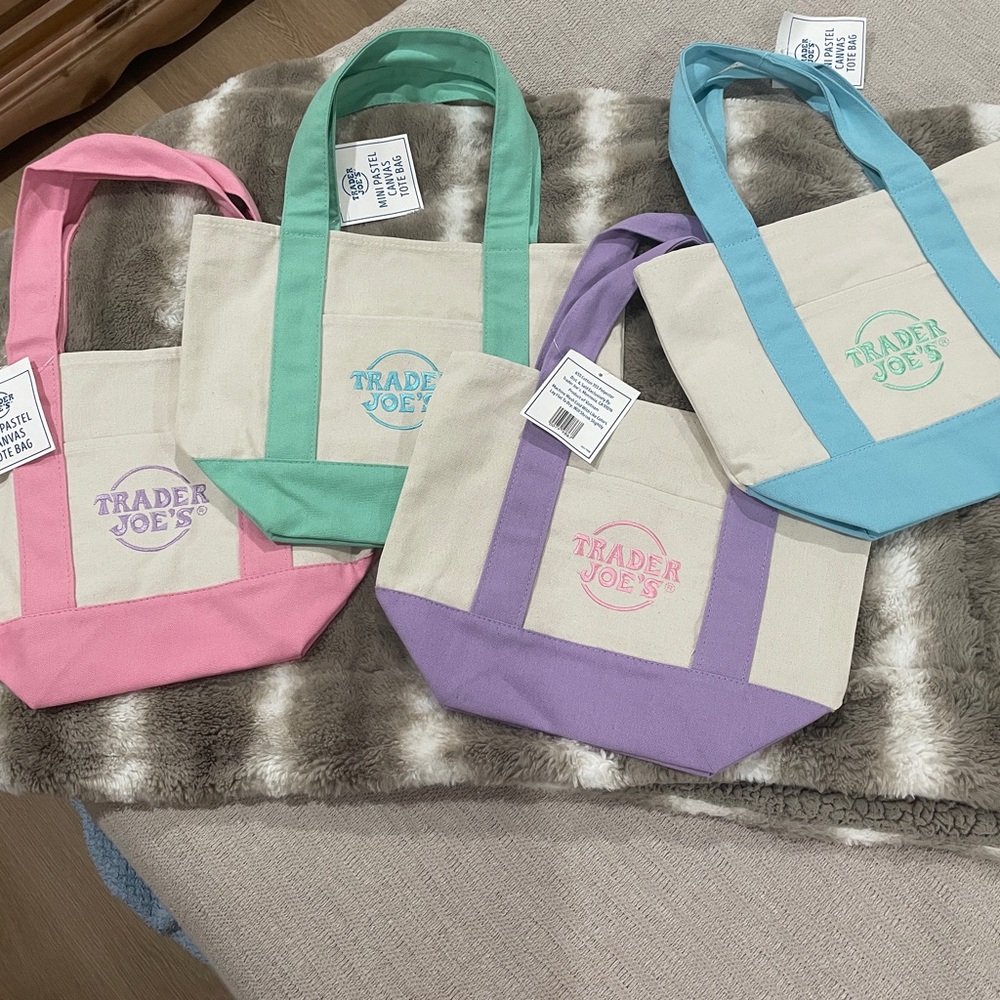 Trader Joe’s Chic Pink, Green, bule, and lavender mini totes. $is for the set